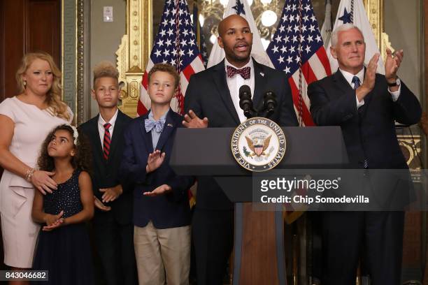 Dr. Jerome Adams delivers remarks after being sworn in as U.S. Surgeon General during a ceremony with his family, wife Lacey Adams and Vice President...