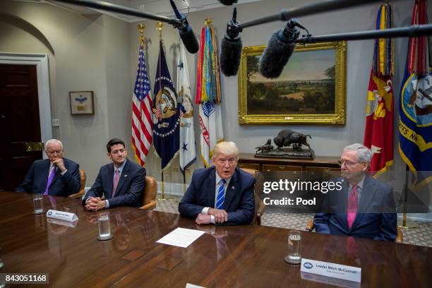 President Donald Trump , with Chairman of the Senate Finance Committee Orrin Hatch , Speaker of the House Paul Ryan and Senate Majority Leader Mitch...