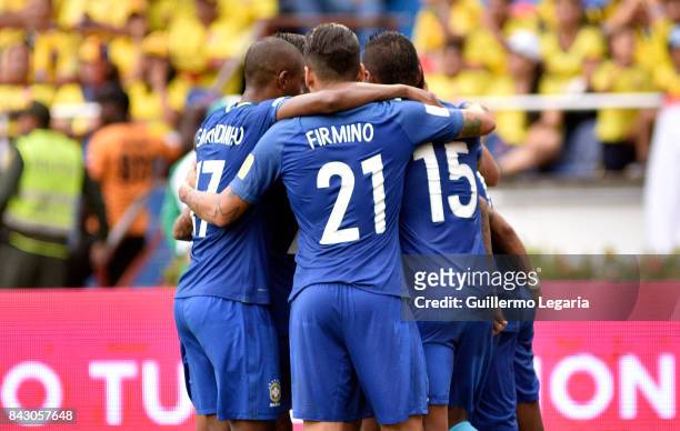 Willian of Brazil celebrates with teammates after scoring the opening goal during a match between Colombia and Brazil as part of FIFA 2018 World Cup...