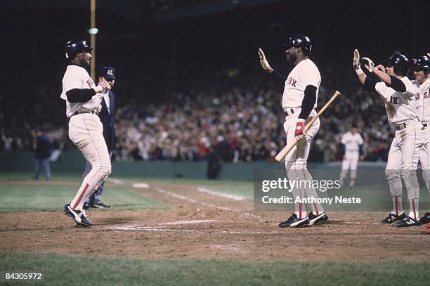 Playoffs: Boston Red Sox Jim Rice victorious with teammates after hitting home run vs California Angels. Game 7. Boston, MA CREDIT: Anthony Neste