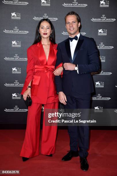 Nicole Warne and a guest arrive for the Jaeger-LeCoultre Gala Dinner during the 74th Venice International Film Festival at Arsenale on September 5,...