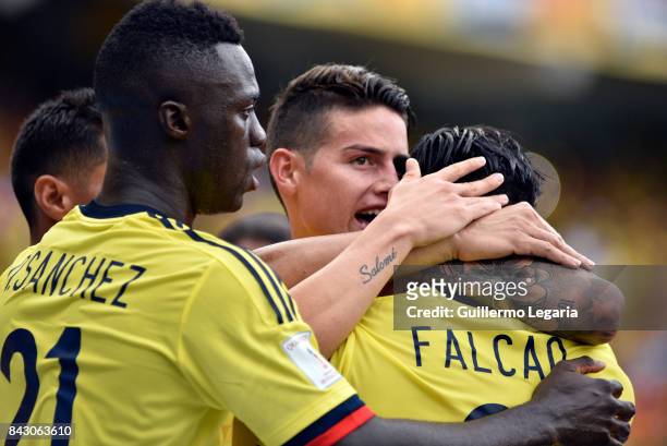 Radamel Falcao of Colombia celebrates with with James Rodriguez after scoring the equalizer during a match between Colombia and Brazil as part of...