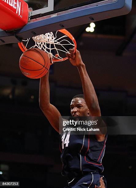 Hasheem Thabeet of the Connecticut Huskies dunks the ball against the St. John's Red Storm on January 15, 2009 at Madison Square Garden in New York...