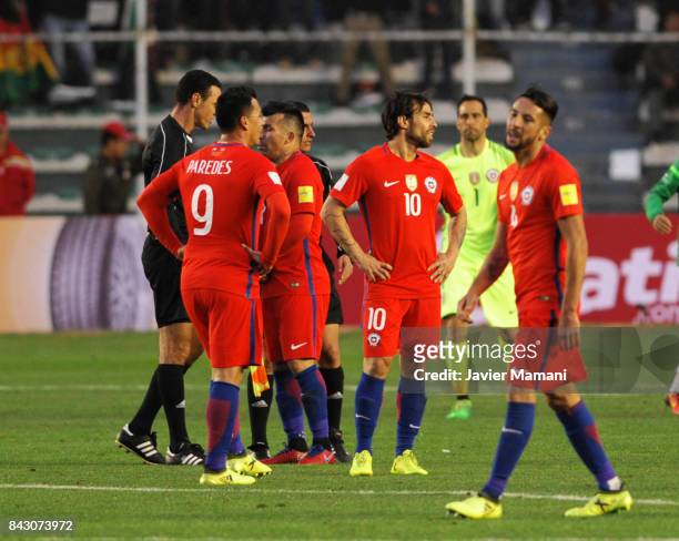 Esteban Paredes and Jorge Valdivia of Chile look dejected after losing a match between Bolivia and Chile as part of FIFA 2018 World Cup Qualifiers at...