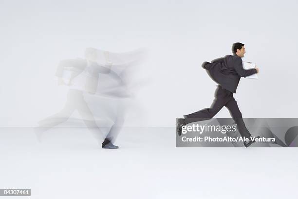businessman running with document - double exposure running stock pictures, royalty-free photos & images