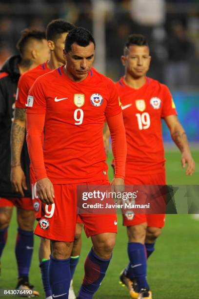 Esteban Paredes and Leonardo Valencia of Chile look dejected after losing a match between Bolivia and Chile as part of FIFA 2018 World Cup Qualifiers...