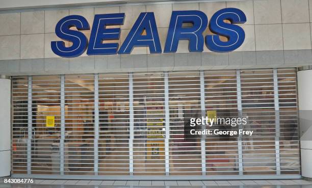 Metal gates block one of the entrances to a Sears store that is closing on September 5, 2017 in Provo, Utah. The Sears store which has been open for...