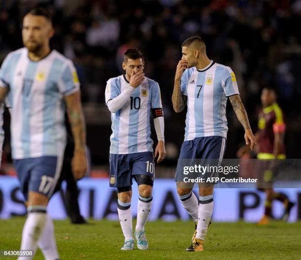 Argentina's Lionel Messi and Argentina's Mauro Icardi leave the field in the half-time, during their 2018 World Cup qualifier football match in...