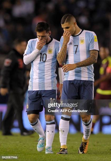 Argentina's Lionel Messi and Argentina's Mauro Icardi leave the field in the half-time, during their 2018 World Cup qualifier football match in...