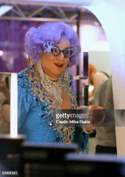 Dame Edna Everage poses for a photo during the official launch of MAC cosmetics at the David Jones Elizabeth Street Store on January 16, 2009 in...