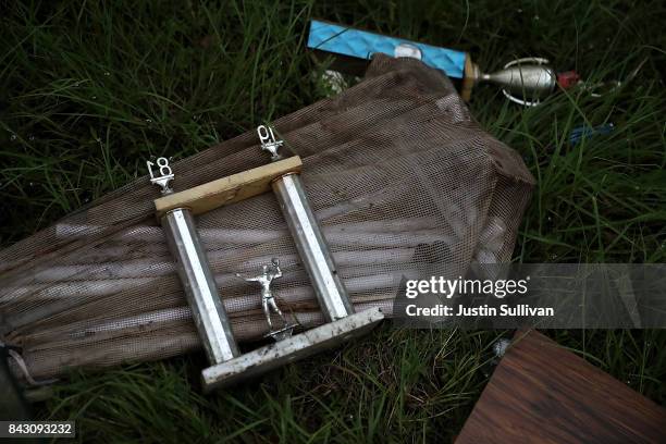 Trophies sit next to a trash pile in front of a flood damaged home on September 5, 2017 in Houston, Texas. Over a week after Hurricane Harvey hit...