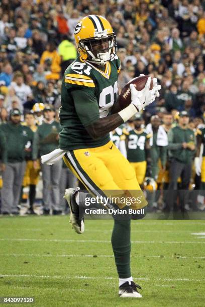 Geronimo Allison of the Green Bay Packers catches a pass in the second quarter against the Los Angeles Rams during a preseason game at Lambeau Field...