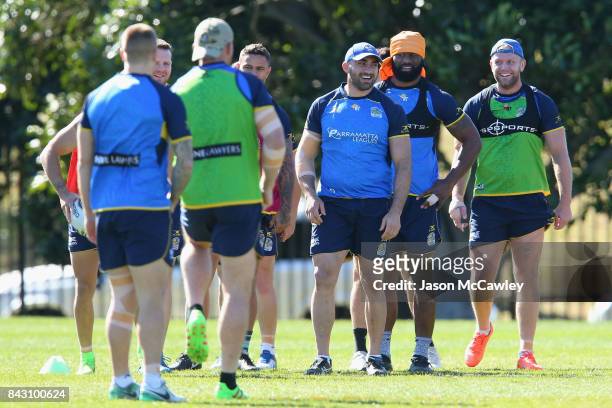 Tim Mannah, Semi Radradra and David Gower of the Eels during a Parramatta Eels NRL training session at Old Saleyards Reserve on September 6, 2017 in...