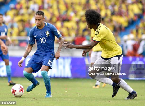 Neymar Jr of Brazil struggles for the ball with Carlos Sanchez of Colombia during a match between Colombia and Brazil as part of FIFA 2018 World Cup...