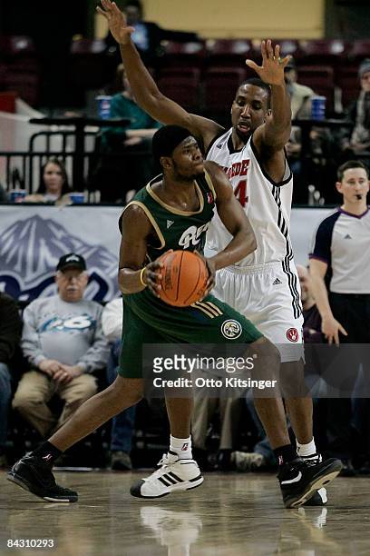 Ernest Scott of the Idaho Stampede defends Patrick Ewing of the Reno Bighorns during the D-League game on January 15, 2009 at Qwest Arena in Boise,...