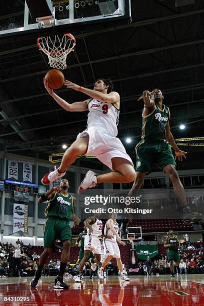 Luke Jackson of the Idaho Stampede goes up to the basket past Damone Brown of the Reno Bighorns during the D-League game on January 15, 2009 at Qwest...