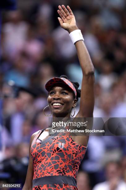Venus Williams of the United States reacts after defeating Petra Kvitova of Czech Republic during her Women's Singles Quarterfinal match on Day Nine...
