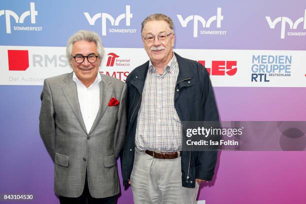 Juerg Bachmann, CEO Verband Schweizer Privatradios and Markus Ruoss attend the Summer Reception Of VPRT Organization at LV Niedersachsen on September...