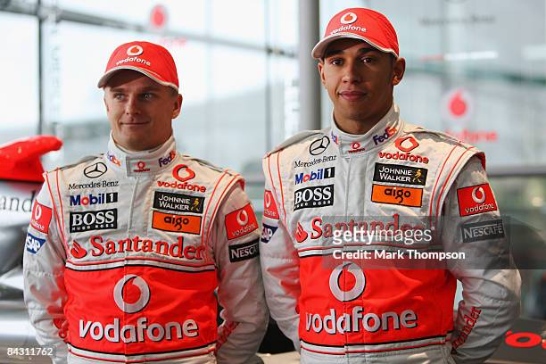 Mclaren Mercedes drivers Heikki Kovalainen of Finland and Lewis Hamilton of Great Britain attend the unveiling of the McLaren Mercedes MP4-24 at the...