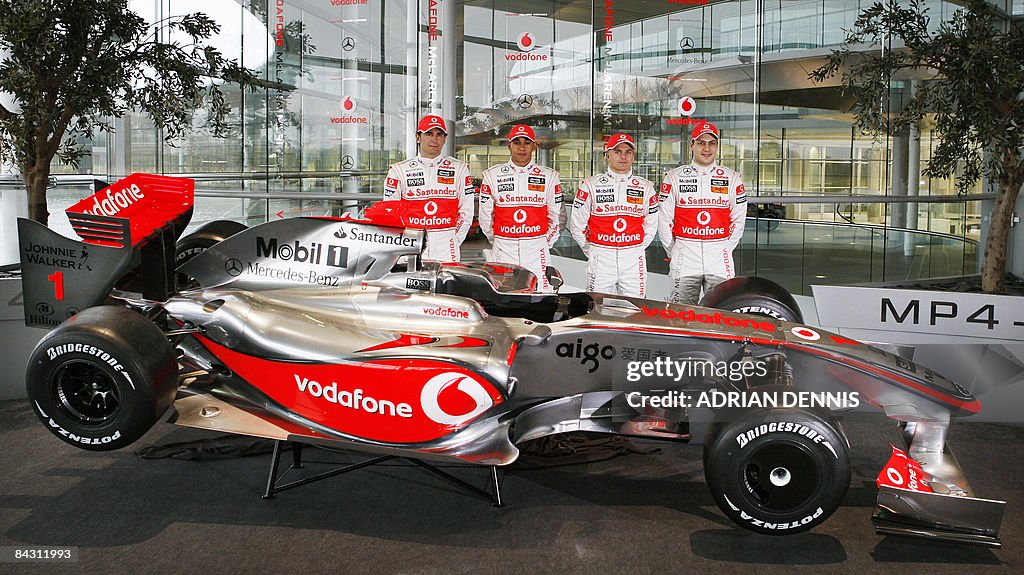 McLaren drivers Pedro De La Rosa (L) Lew