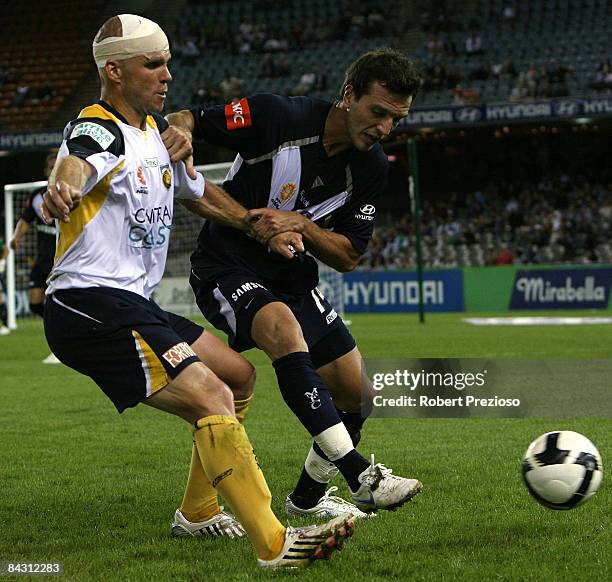 Andre Gumprecht of the Mariners contests the ball during the round 20 A-League match between the Melbourne Victory and the Central Coast Mariners at...