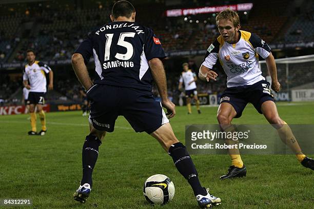 Tomislav Pondeljak of the Victory looks for a way through during the round 20 A-League match between the Melbourne Victory and the Central Coast...