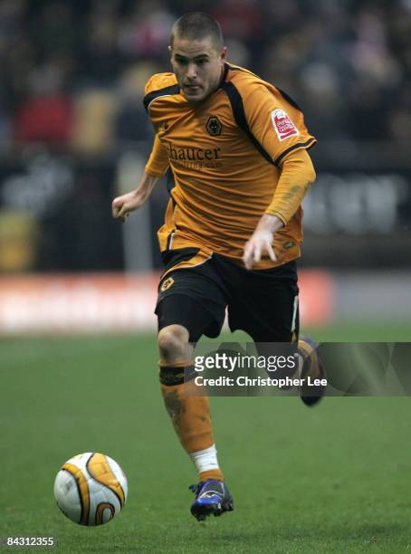 Michael Knightly of Wolverhampton Wanderers runs with the ball during the Coca-Cola Championship match between Wolverhampton Wanderers and Preston...