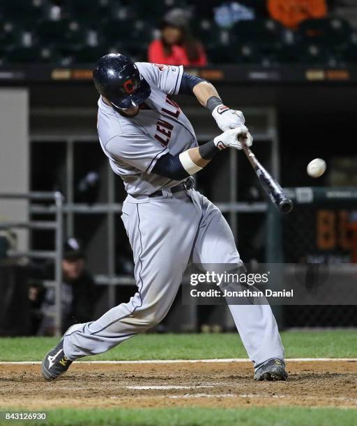 Yan Gomes of the Cleveland Indians hits a three run home run in the 9th inning against the Chicago White Sox at Guaranteed Rate Field on September 5,...