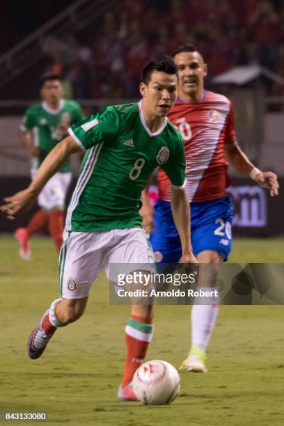 Hirving Lozano of Mexico drives the ball during the match between Costa Rica and Mexico as part of the FIFA 2018 World Cup Qualifiers at Nacional de...