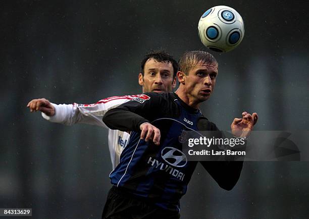 Thomas Zdebel of Leverkusen challenges Gennadi Blizniuk of Frankfurt during a friendly match between Bayer Leverkusen and FSV Frankfurt at Sueno Golf...