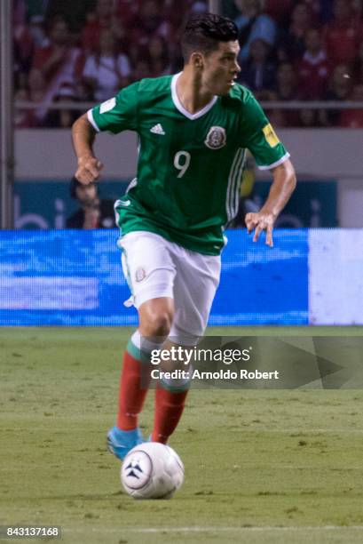 Raul Jimenez of Mexico drives the ball during the match between Costa Rica and Mexico as part of the FIFA 2018 World Cup Qualifiers at Nacional de...