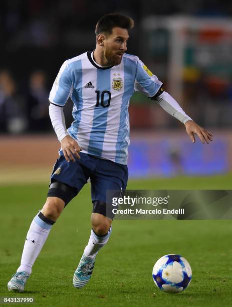 Lionel Messi of Argentina drives the ball during a match between Argentina and Venezuela as part of FIFA 2018 World Cup Qualifiers at Monumental...