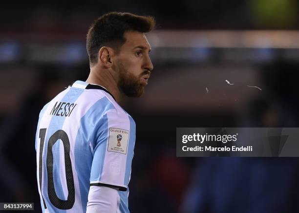 Lionel Messi of Argentina spits during a match between Argentina and Venezuela as part of FIFA 2018 World Cup Qualifiers at Monumental Stadium on...