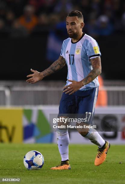 Nicolas Otamendi of Argentina drives the ball during a match between Argentina and Venezuela as part of FIFA 2018 World Cup Qualifiers at Monumental...