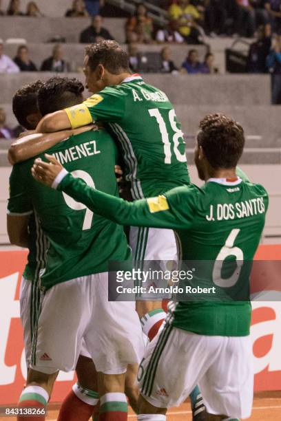 Players of Mexico celebrate their team's first goal during the match between Costa Rica and Mexico as part of the FIFA 2018 World Cup Qualifiers at...