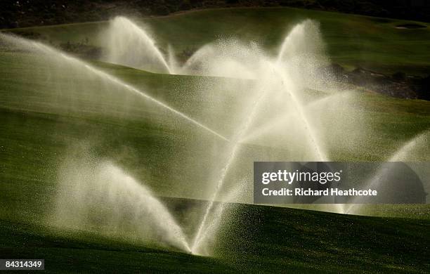 Sprinklers water a fairway at the Pinnacle Point Golf Course at Pinnacle Point Beach and Golf Resort on January 14, 2009 in Mossel Bay, South Africa.