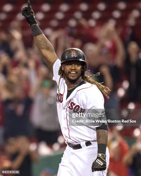 Hanley Ramirez of the Boston Red Sox reacts after hitting a game winning walk-off single during the nineteenth inning of a game against the Toronto...