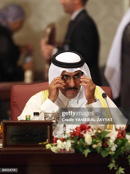 Qatari Finance Minister Yussef Hussein Kamal attends of the Arab Economic Summit in Kuwait City on January 14, 2009. Arab countries, which sustained...