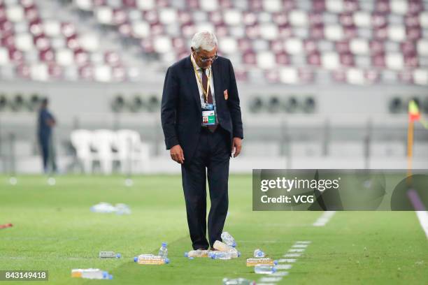 Head coach Marcello Lippi of China reacts during the 2018 FIFA World Cup qualifier game between Qatar and China at Khalifa International Stadium on...