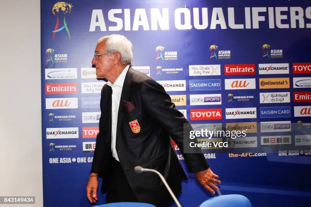 Head coach Marcello Lippi of China attends a press conference after the 2018 FIFA World Cup qualifier game between Qatar and China at Khalifa...