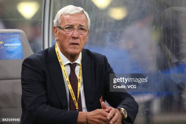 Head coach Marcello Lippi of China reacts during the 2018 FIFA World Cup qualifier game between Qatar and China at Khalifa International Stadium on...