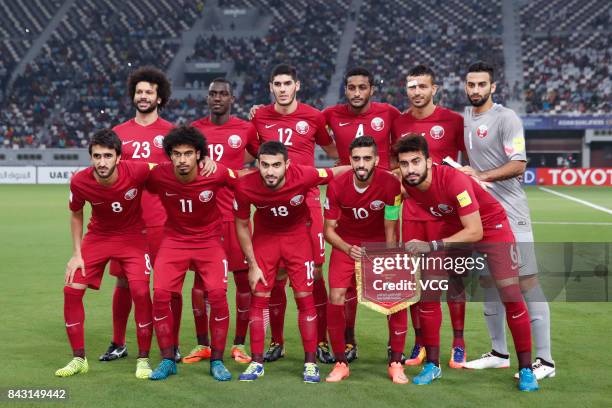 Players of Qatar line up before the 2018 FIFA World Cup qualifier game between Qatar and China at Khalifa International Stadium on September 5, 2017...