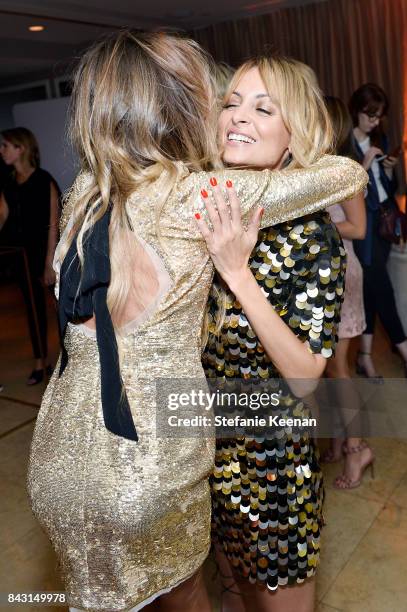 Nicole Richie and Erica Pelosini attend Rachel Zoe SS18 Presentation at Sunset Tower Hotel on September 5, 2017 in West Hollywood, California.