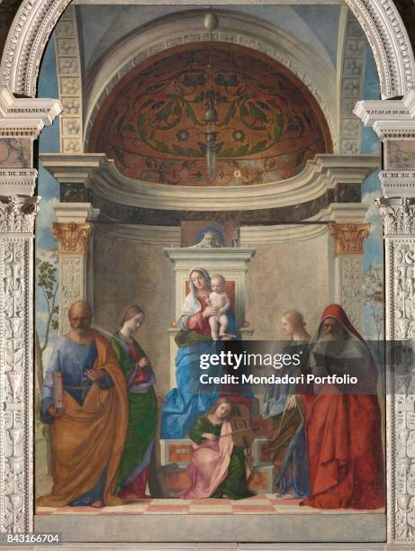 Italy, Veneto, Venice, San Zaccaria Church. Detail. The Madonna and Child enthroned, a musician angel on a step and four saints placed symmetrically...