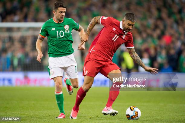 Aleksandar Koralov of Serbia and Robbie Brady of Ireland during the FIFA World Cup 2018 Qualifying Round match between Republic of Ireland and Serbia...