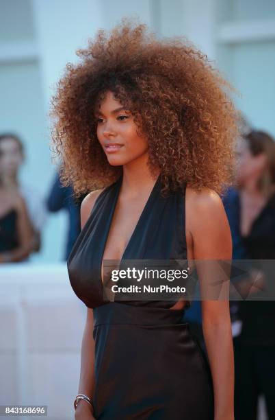 Tina Kunakey walks the red carpet ahead of the 'mother!' screening during the 74th Venice Film Festival at Sala Grande on September 5, 2017 in...