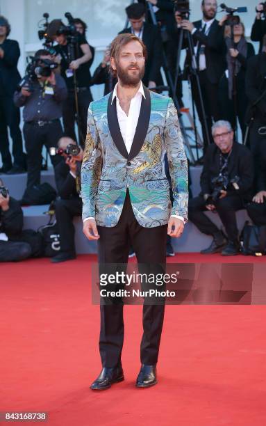 Alessandro Borghi walks the red carpet ahead of the 'mother!' screening during the 74th Venice Film Festival at Sala Grande on September 5, 2017 in...