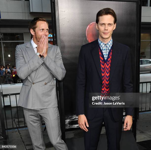 Actors Bill Skarsgard and Alexander Skarsgard attends the premiere of "It" at TCL Chinese Theatre on September 5, 2017 in Hollywood, California.