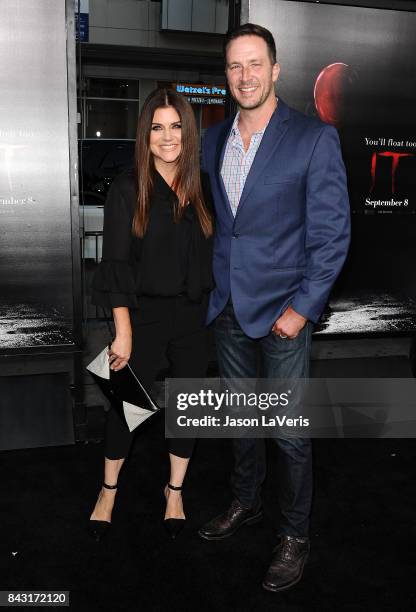 Actress Tiffani Thiessen and husband Brady Smith attend the premiere of "It" at TCL Chinese Theatre on September 5, 2017 in Hollywood, California.