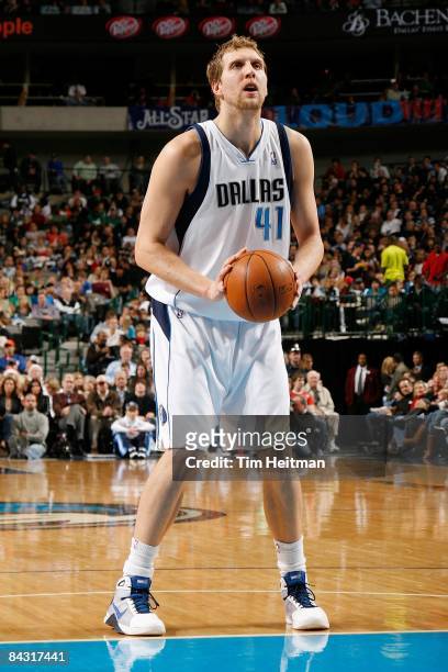 Dirk Nowitzki of the Dallas Mavericks shoots a free throw during the game against the Memphis Grizzlies on December 23, 2008 at American Airlines...